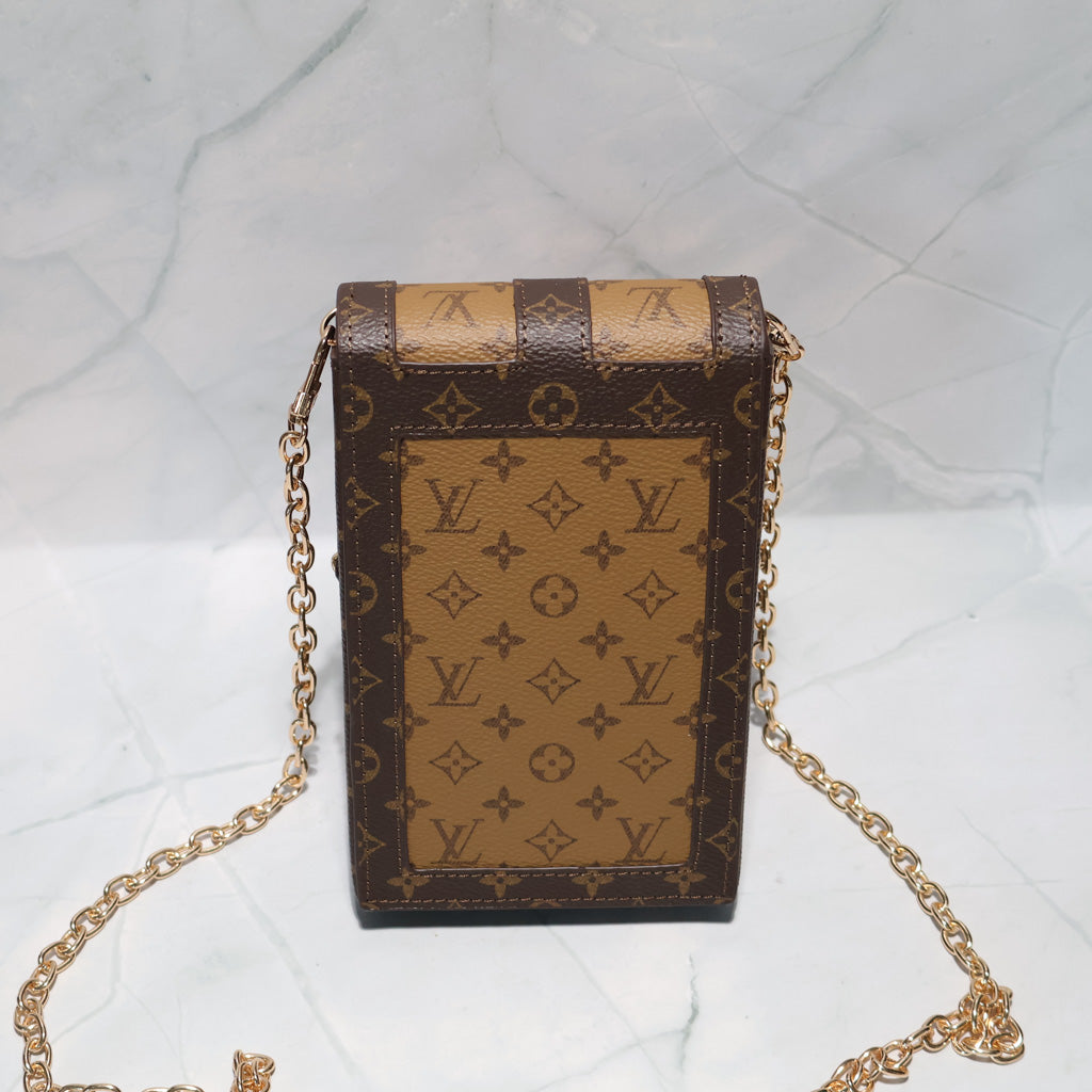 LV Vertical Trunk Pochette Crossbody Bag